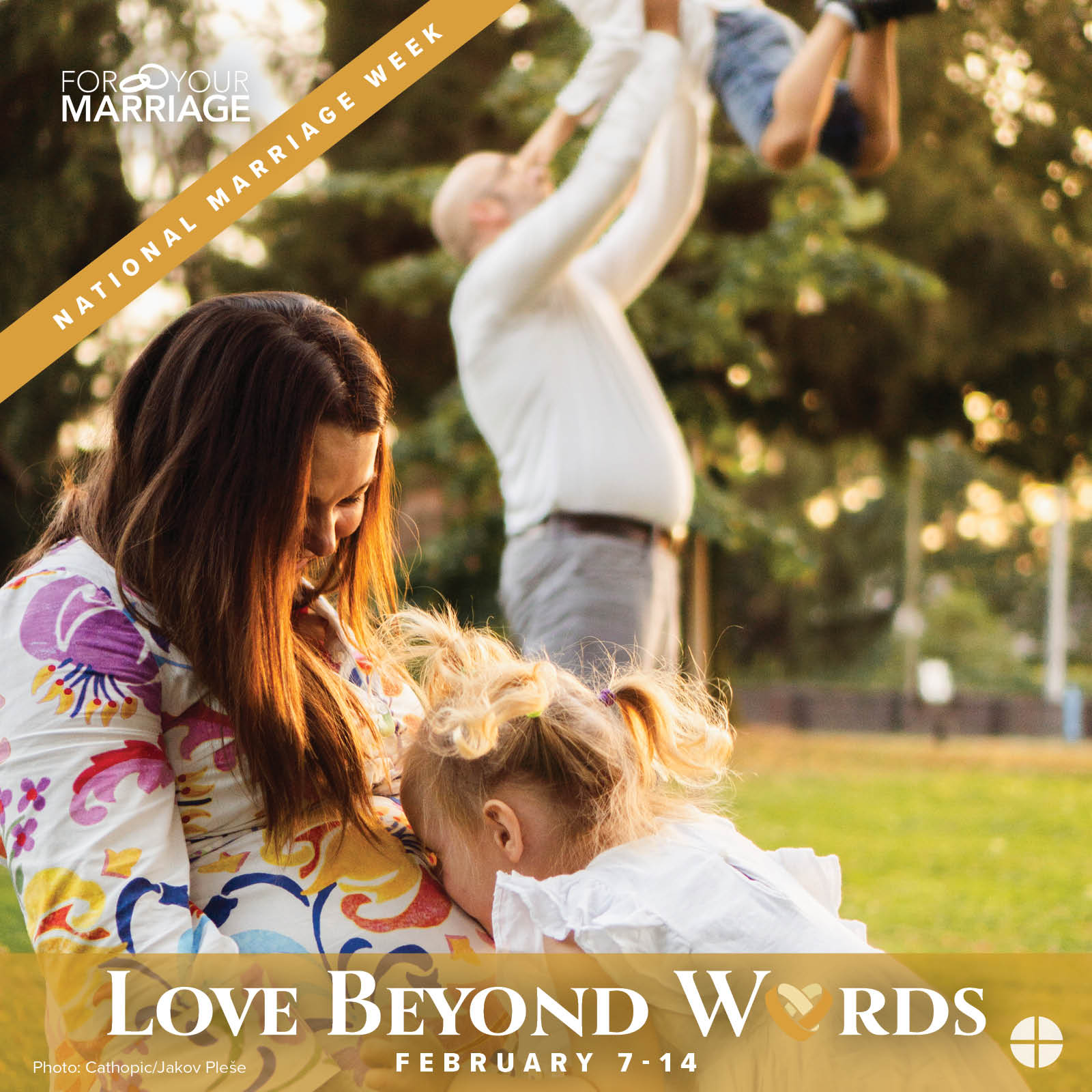 Pregnant woman on a lawn with her daughter