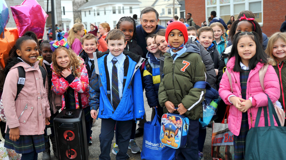 Principal Burke with students