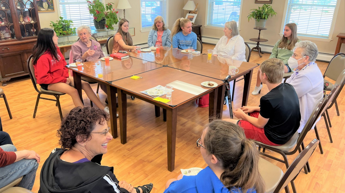 Students with seniors at the Trafton Center