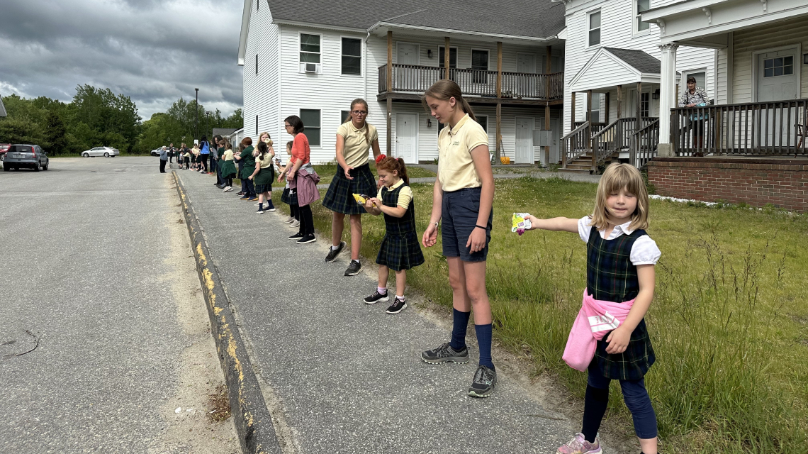 St. John's Human Chain to Mid Coast Hunger Prevention Program in Brunswick 