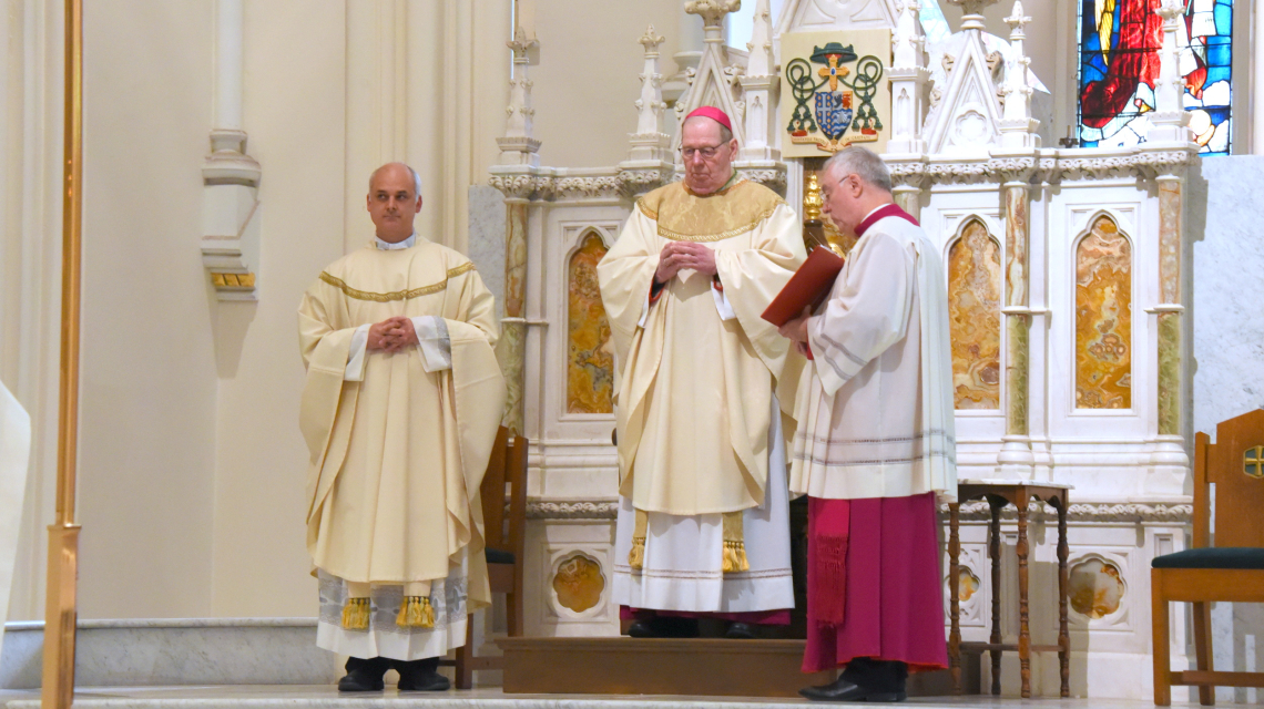 Bishop Robert Deeley, Father Seamus Griesbach, and Msgr. Marc Caron