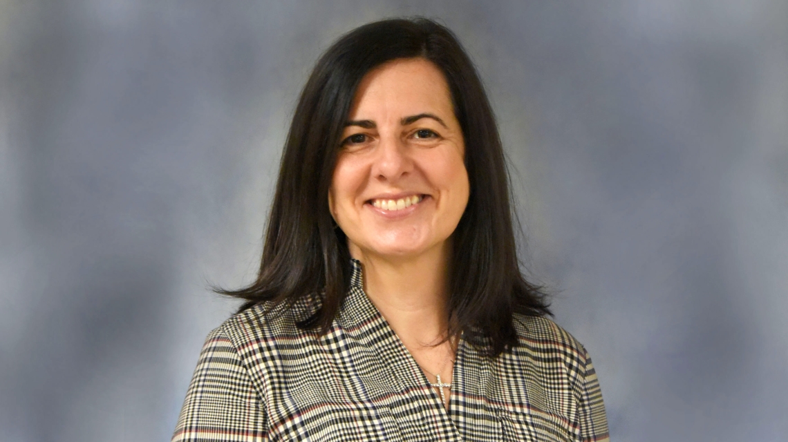 Headshot of woman with dark hair
