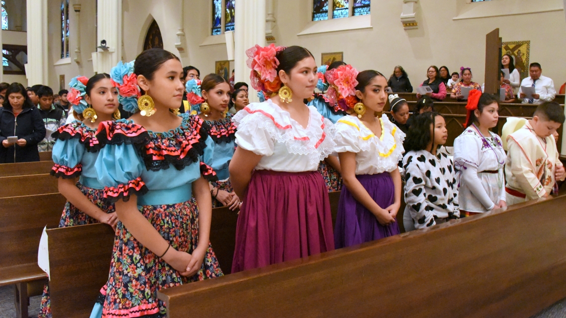 Women in colorful dresses.