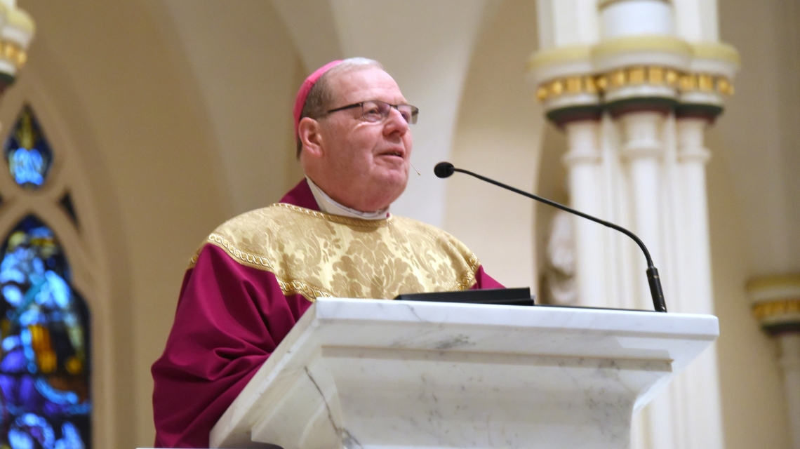 Bishop Robert Deeley delivering a homily.