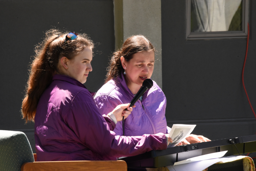 Leading parishioners in song