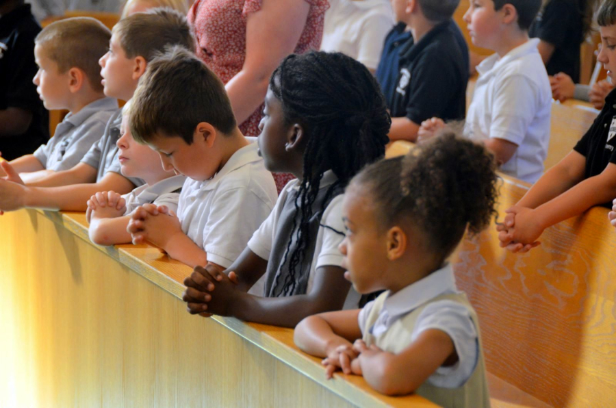 Students at St. Dominic Academy open Mass