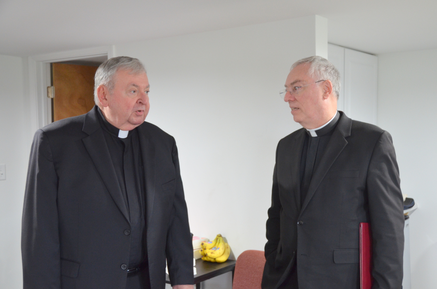 Bishop Deeley blesses the new office at St. Joseph Cemetery in Biddeford. 