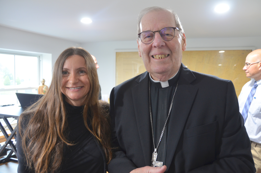 Bishop Deeley blesses the new office at St. Joseph Cemetery in Biddeford. 