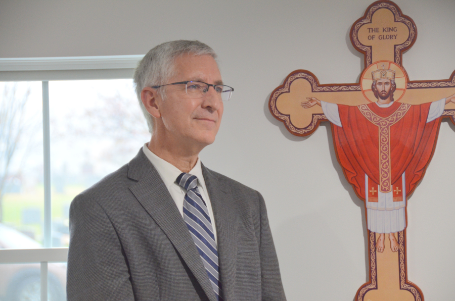 Bishop Deeley blesses the new office at St. Joseph Cemetery in Biddeford. 