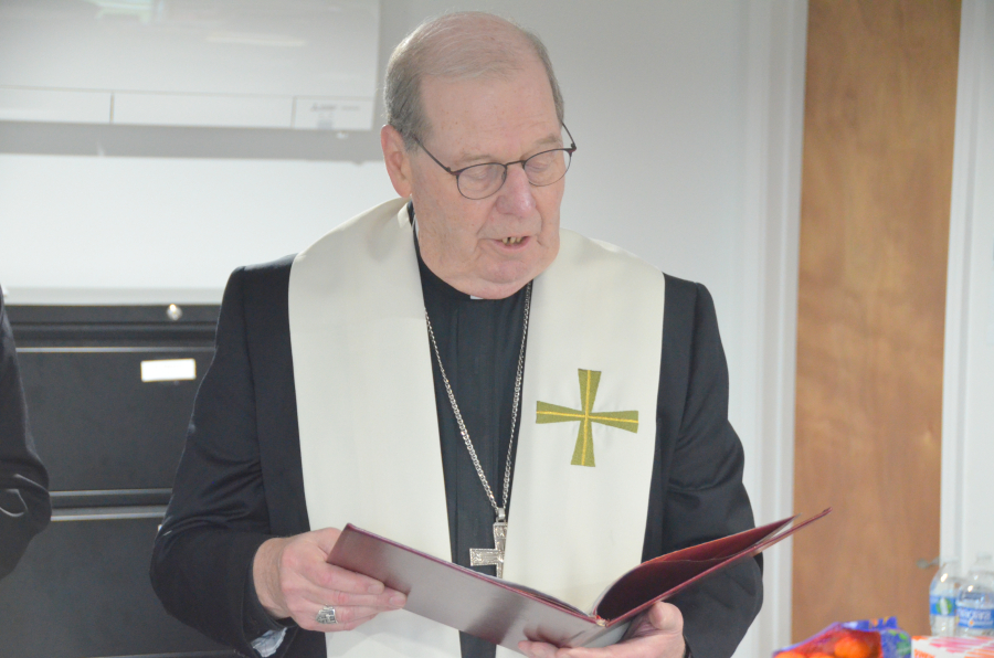 Bishop Deeley blesses the new office at St. Joseph Cemetery in Biddeford. 