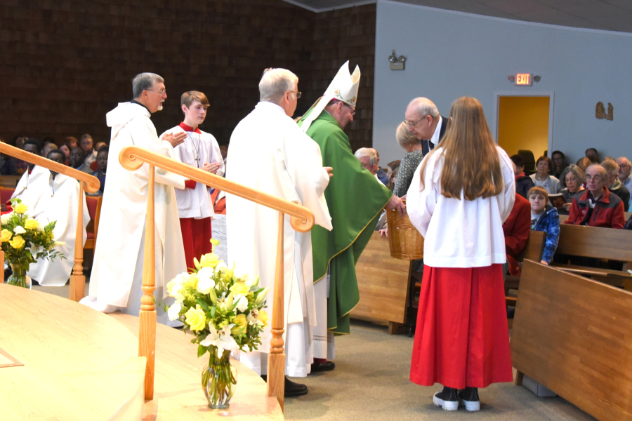 Presenting the gifts to the bishop