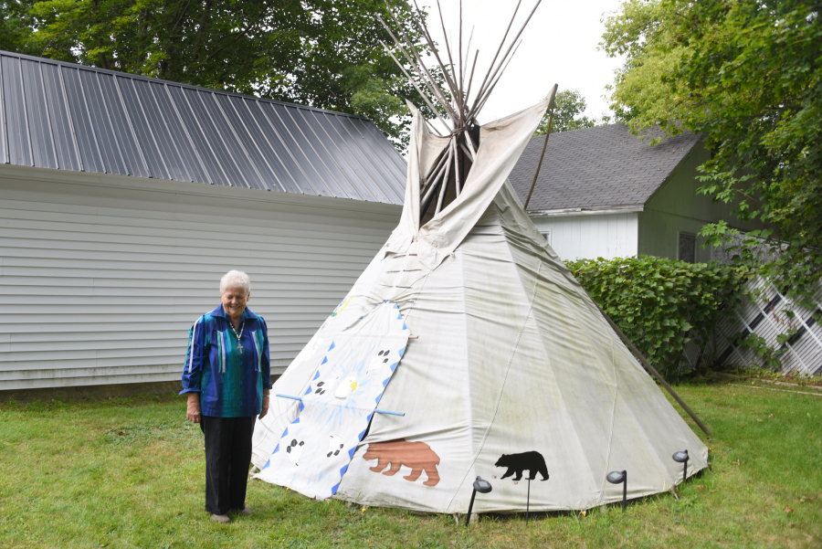 Sister Bernadette Gautreau outside her teepee