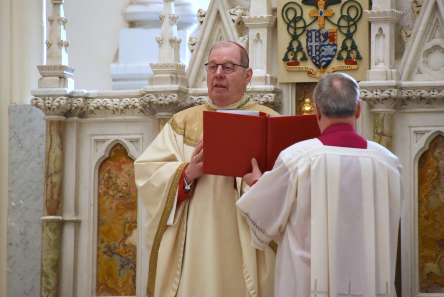 Bishop delivers the opening prayer