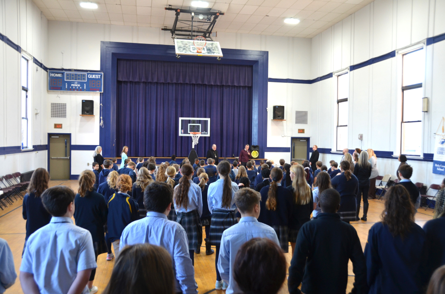 Bishop Deeley Visits Holy Cross School in South Portland 