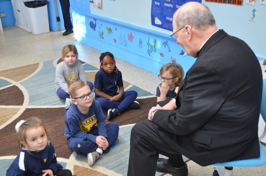 Bishop Deeley Visits Holy Cross School in South Portland 