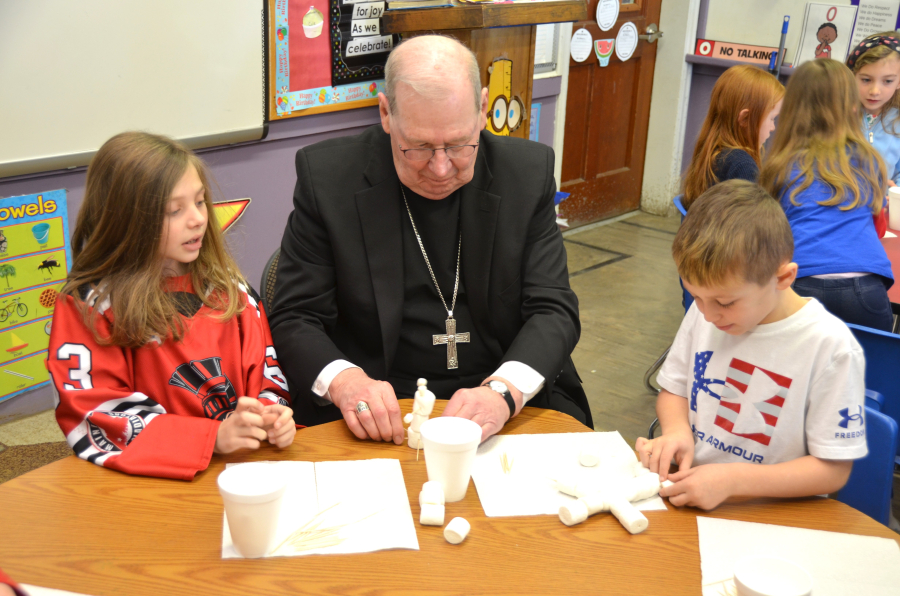 Bishop Deeley visits St. Dom's Lewiston campus during Maine Catholic Schools Week. 