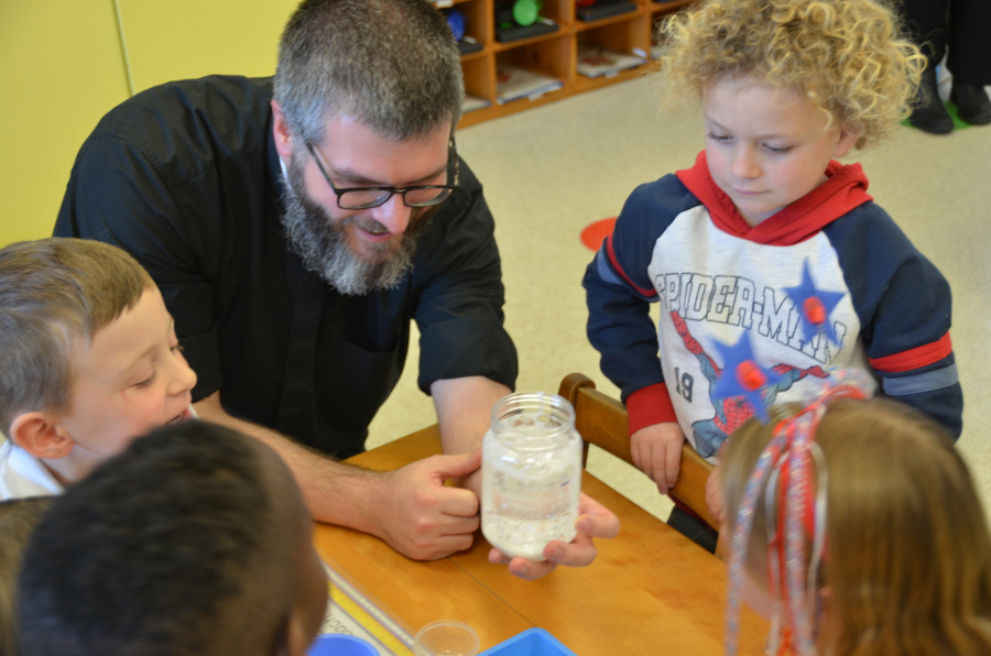 Bishop Deeley visits St. Dom's Lewiston campus during Maine Catholic Schools Week. 