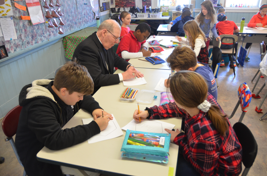 Bishop Deeley visits St. Dom's Lewiston campus during Maine Catholic Schools Week. 