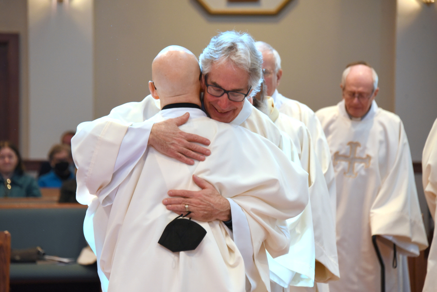 Fraternal kiss of peace from Deacon Carl Gallagher