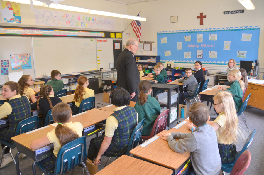 Bishop Deeley visits St. John's Catholic School community in Brunswick. 