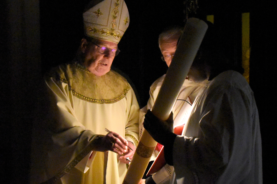 Preparing the paschal candle