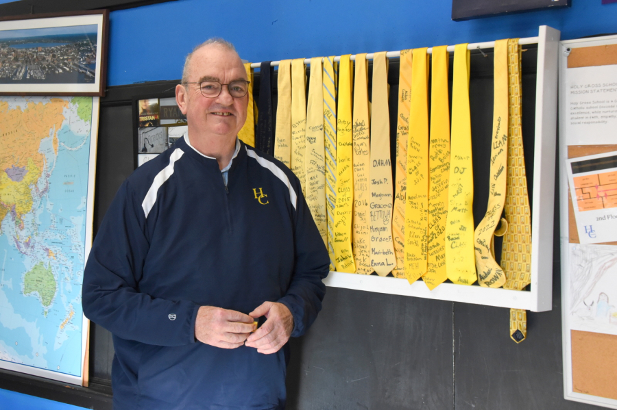 William Ridge with his collection of yellow ties.