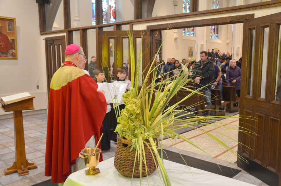 Bishop Deeley celebrates Mass on Palm Sunday in Portland. 