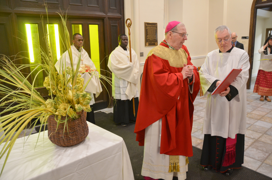 Bishop Deeley celebrates Mass on Palm Sunday in Portland. 