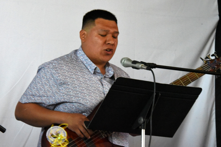 Jonathan Majano playing the guitar