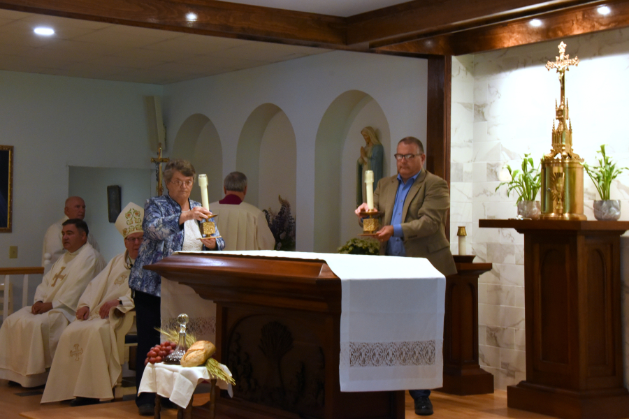 Placing the candles on the altar