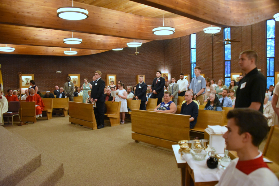 Candidates stand before the bishop