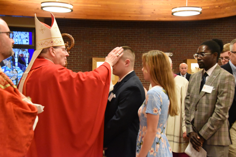 Receiving the sacrament of confirmation