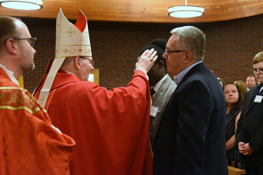 Receiving the sacrament of confirmation