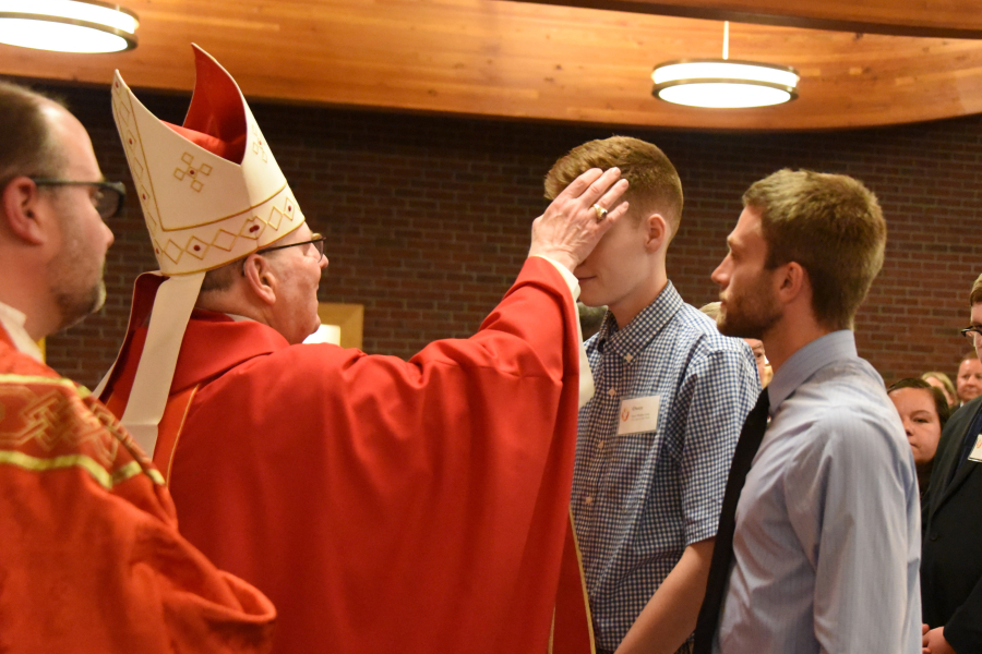 Receiving the sacrament of confirmation