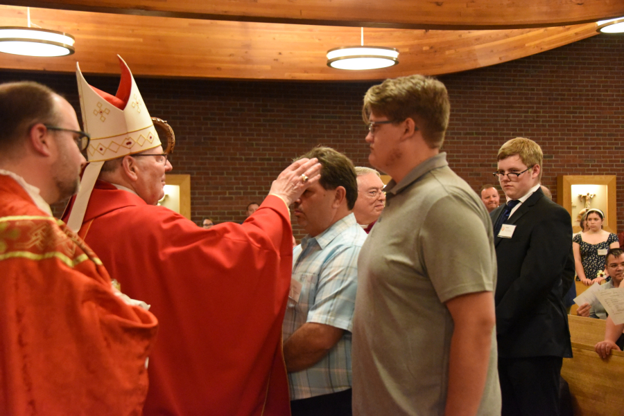 Receiving the sacrament of confirmation