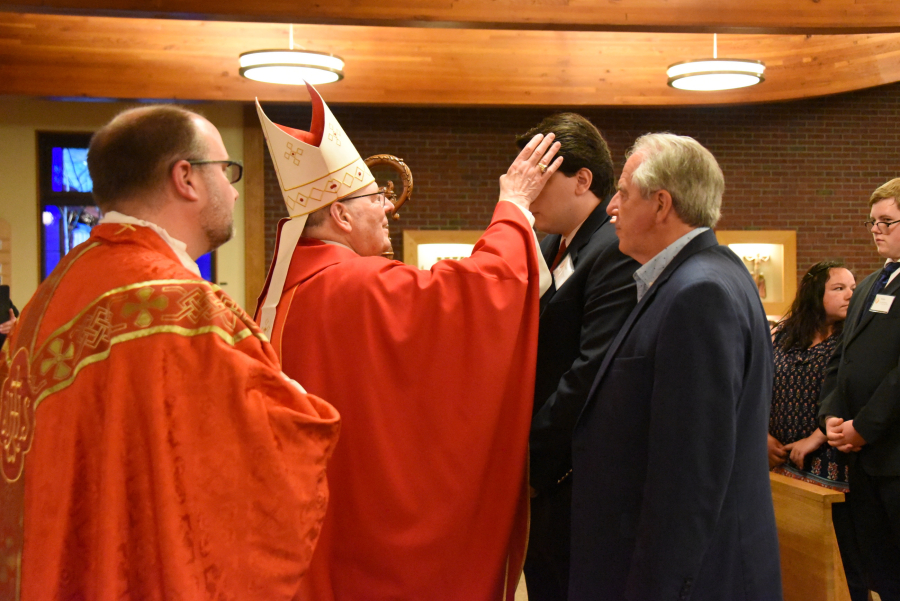 Receiving the sacrament of confirmation