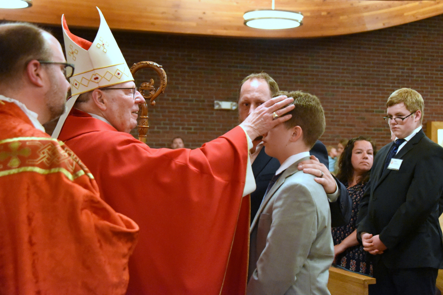 Receiving the sacrament of confirmation