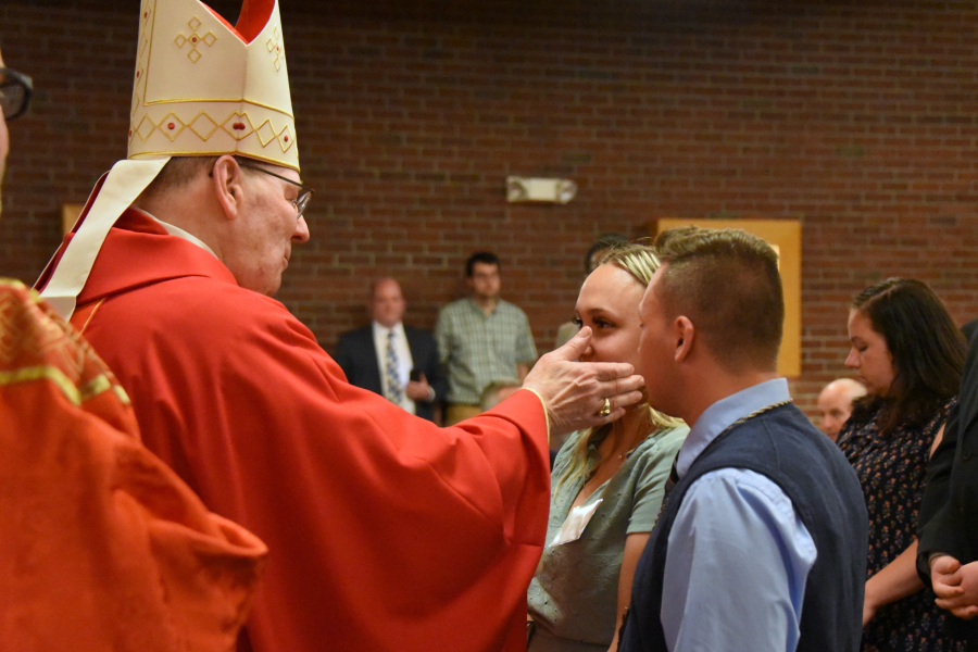 Receiving the sacrament of confirmation