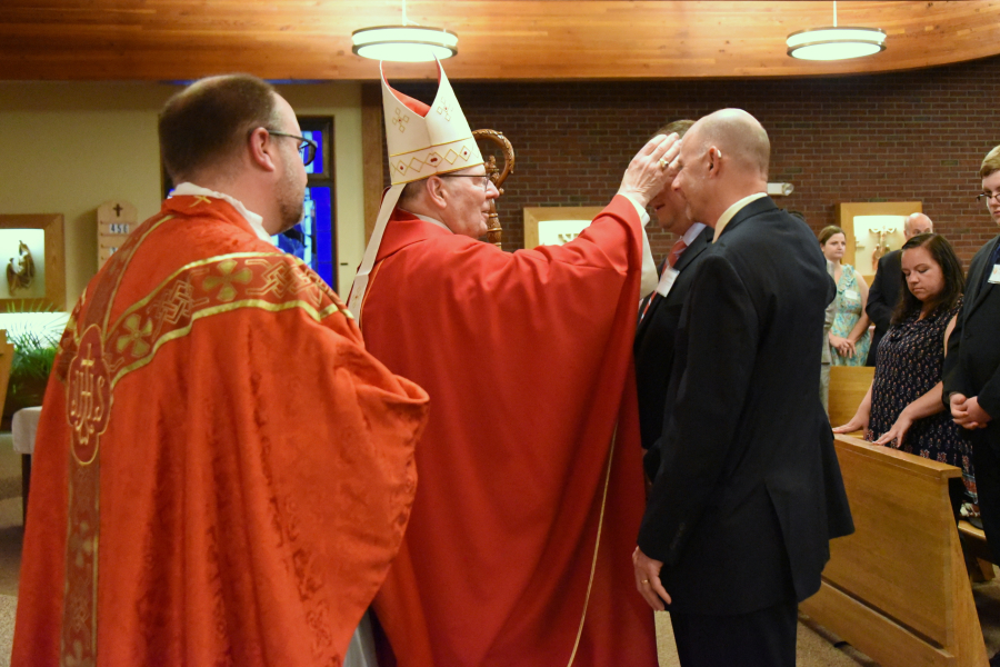 Receiving the sacrament of confirmation