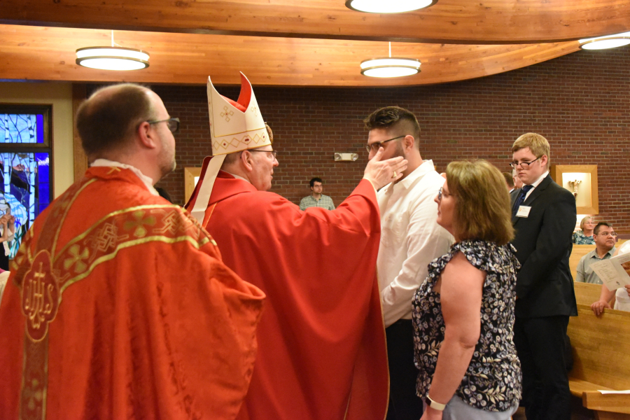 Receiving the sacrament of confirmation