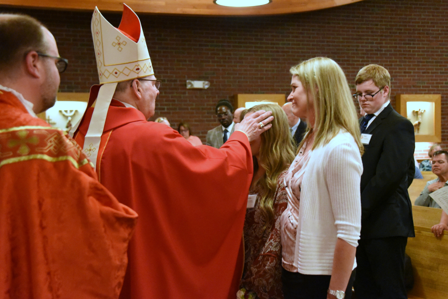 Receiving the sacrament of confirmation