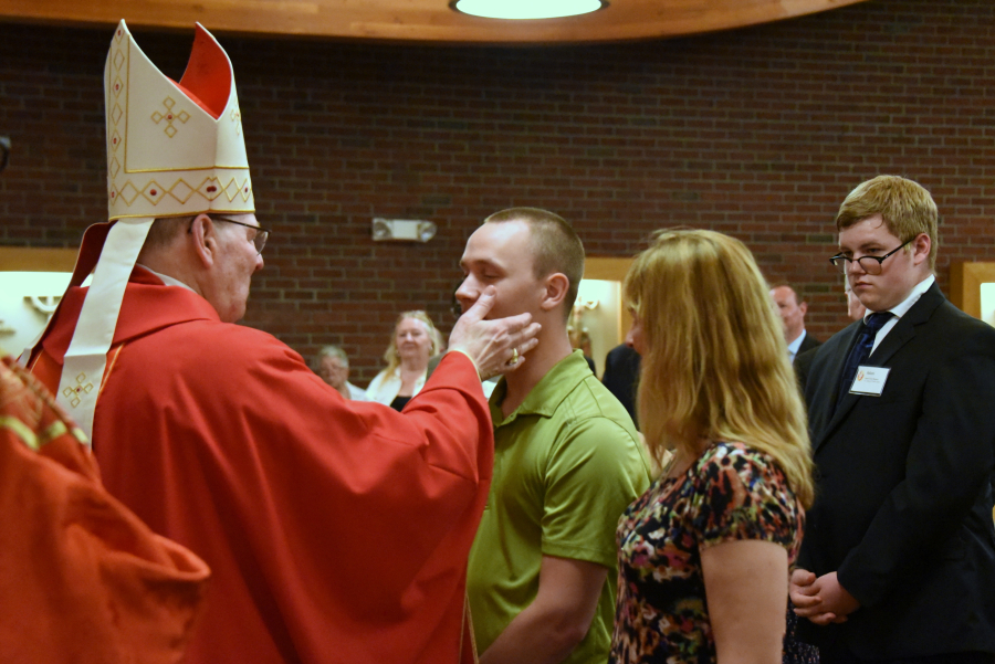 Receiving the sacrament of confirmation