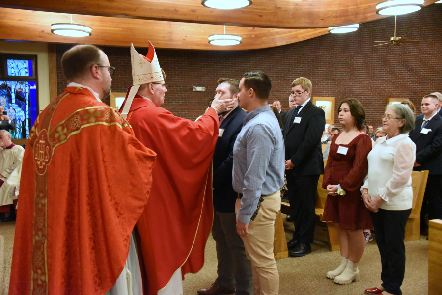 Receiving the sacrament of confirmation