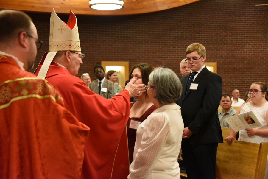 Receiving the sacrament of confirmation