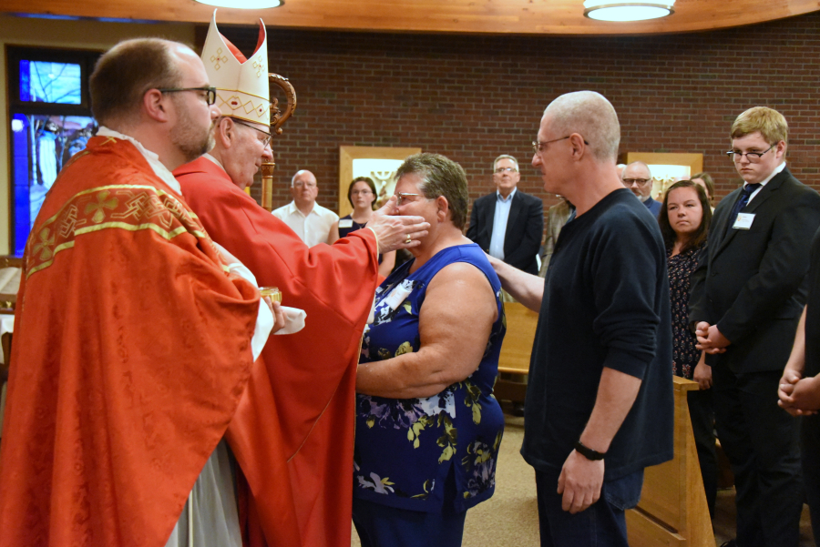 Receiving the sacrament of confirmation