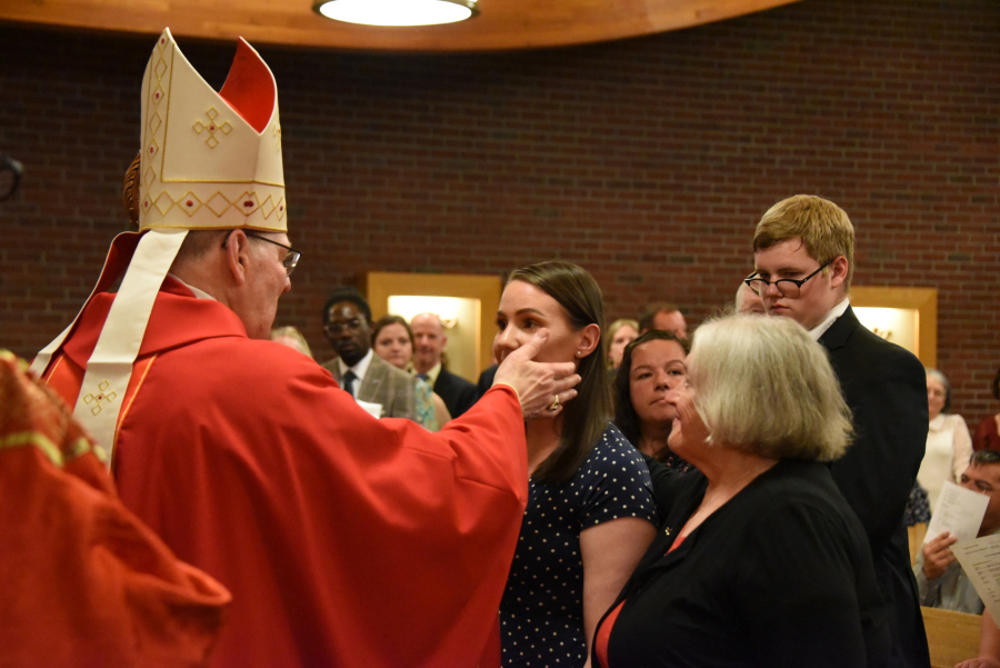 Receiving the sacrament of confirmation