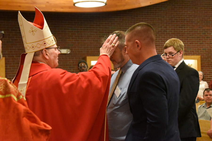 Receiving the sacrament of confirmation