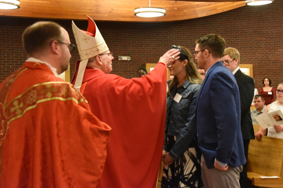 Receiving the sacrament of confirmation