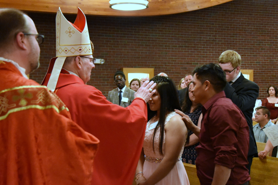 Receiving the sacrament of confirmation