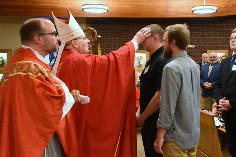 Receiving the sacrament of confirmation